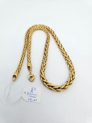 a gold chain with a tag attached to it