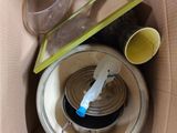 a cardboard box with a lot of items inside of it