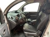 the interior of a car with the door open and the driver ' s seat down