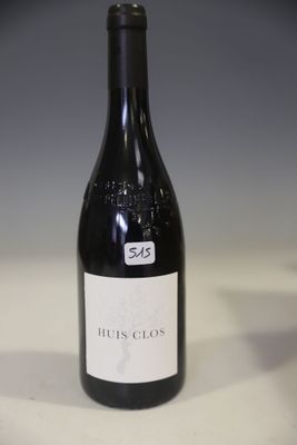 a bottle of wine that is sitting on a table
