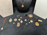 a group of jewelry including a necklace, earrings, and a purse