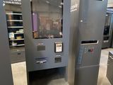 a machine that is sitting inside of a building