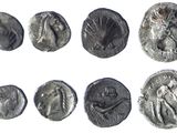 six ancient roman silver coins with faces of men and women