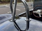 a close up of a car ' s dashboard and steering wheel