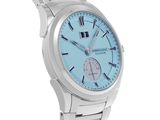 a close up of a watch on a white background with a blue face