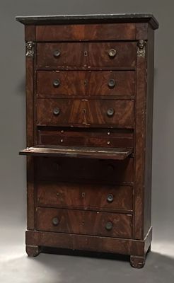 a wooden cabinet with drawers and a shelf on top of it