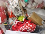 a box full of toys and other items that are on the floor