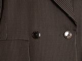 a close up of a man ' s suit jacket and tie
