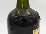 a bottle of wine that is sitting on a table