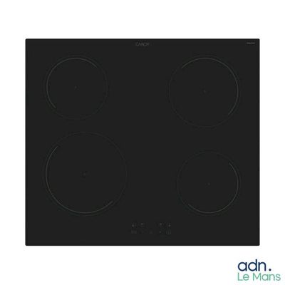 a black stove top with four burners and four burners
