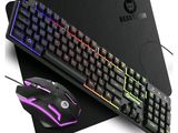 a close up of a keyboard and mouse on a mouse pad