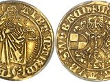a gold coin with an image of a man holding a sword