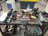 a workbench with tools on it on the street