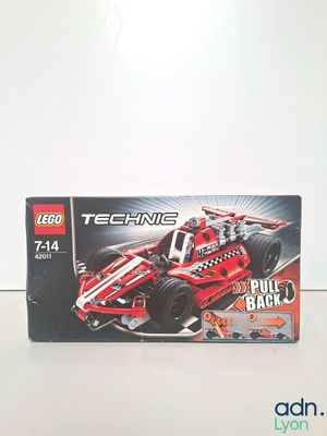 a box of lego technics on a table