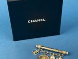 a close up of a box with a bunch of charms on it