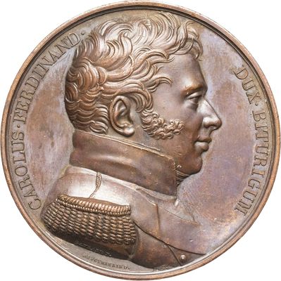 une image d'une médaille de bronze représentant un homme avec une barbe et une moustache