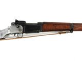 a close up of a rifle on a white background with a white background