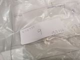 a label on a plastic bag that is wrapped in plastic