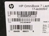 a label on the back of a laptop that says hp omibok laptop