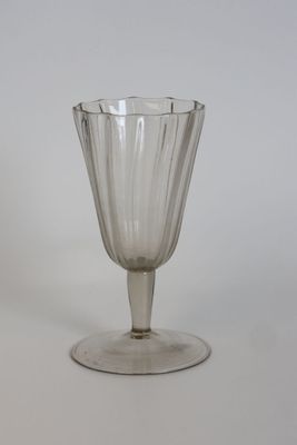 a glass that is sitting on a table