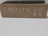 une boîte de Creastyl posée sur une table