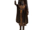 une image représentant une statue d'un homme tenant un oiseau dans la main