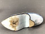 a close up of a pair of shoes on a table