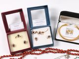 a box of jewelry that is sitting on a table