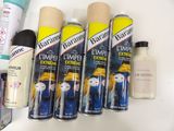 many different types of hair products on a white table