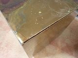 a box that is sitting on the floor next to a table