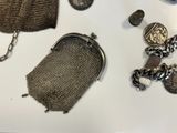 a lot of silver items that are on the table