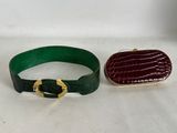 two pieces of green and red leather with a gold buckle