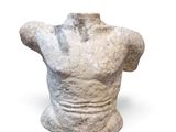 a statue of a man with a torso on a white background