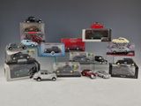 a lot of toy cars that are in a display case