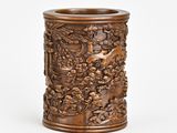 chinese carved wooden brush holder with birds and flowers on it