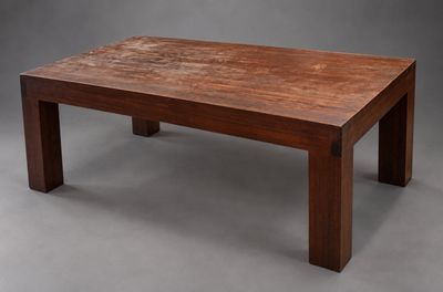 an image of a wooden table on a grey background