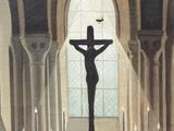 a man standing in front of a crucif in a church