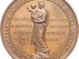 an image of a bronze medal with a woman holding a baby