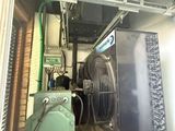 a large air conditioner in the back of a truck