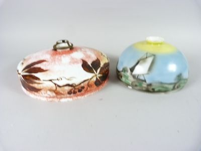two small boxes that are sitting on a table