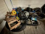 a pile of wires and other wires on the floor