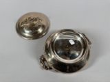 silver plated bowl with a lid and a lid with a lion on it