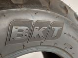 the tire of a motorcycle is shown with the word bkkt on it