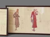 three framed pictures of women ' s fashions on display in a room
