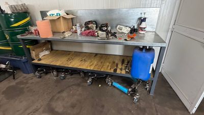 an image of a workbench with a lot of tools on it