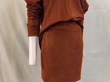 an image of a mannequin wearing a brown dress on a white mannequin