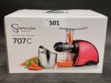 a box with a juicer and a blender inside of it