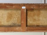 a picture of an old wooden box hanging on the wall