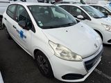 many white cars parked in a parking lot next to each other