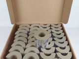 many rolls of toilet paper in a box on the table